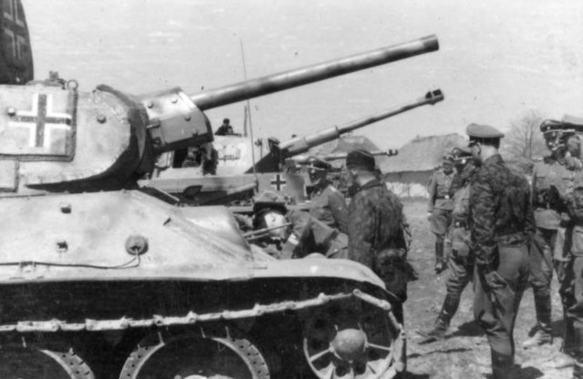 Himmler inspecting a T-34 captured and re-used by the 2nd SS Das Reich Division on the Russian front in April 1943. Bundesarchiv – CC-BY SA 3.0