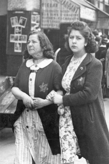 Two Jewish women in occupied Paris wearing Yellow badges in June 1942. Bundesarchiv – CC-BY SA 3.0