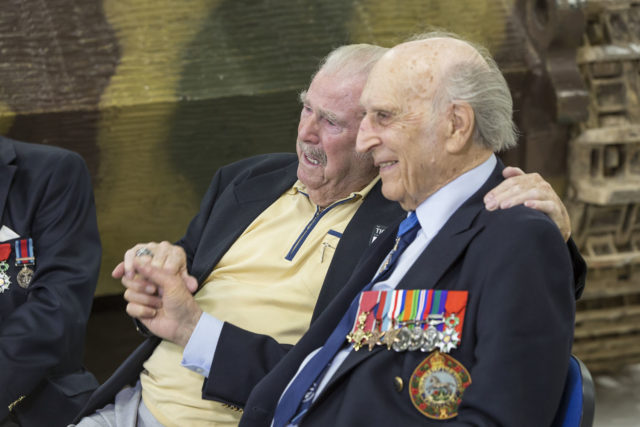 Wilhelm Fischer (left) and Kent Tout a former  Sherman tank gunner in the 1st Northamptonshire Yeomanry. The veterans met for the first time, more than 70 years after they fought on opposite sides during WWII.
