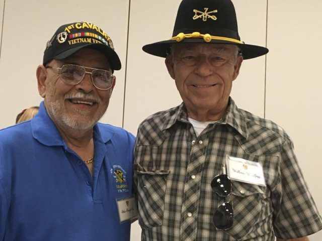 Photo: Karen Murphy/Special to the Times-EnterpriseJohn Rangel Jr. (left), of Hephzibah and William Bass, (right) of Norman Park, served together during the Battle of Ia Drang in 1965. Bass hosted this year’s reunion of the 1st Battalion, 7th Calvary in Albany.