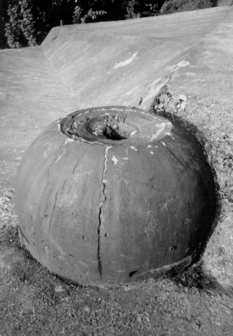 A cupola in Fort Eben-Emael after penetration by a shaped charge.