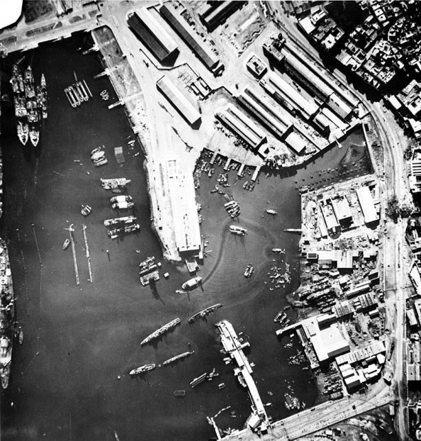 Aerial view of the port of Casablanca, Morocco, at the time of the Allied landings in North Africa. Note the sunken ship in the center of the harbor and the French battleship, Jean Bart, on the left.