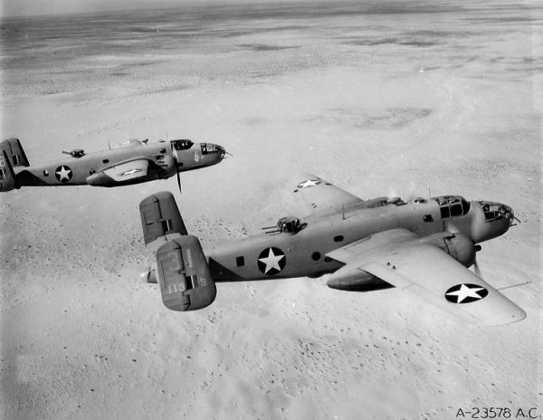 North American B-25D-20 Mitchells of the 12th Bomb Group over North Africa, 1943.
