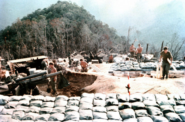 Marines complete construction of M101 howitzer positions at a mountain-top fire support base, 1968.