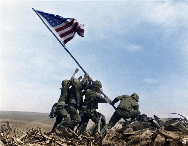 America’s most iconic image of victory is immediately plagued with controversy “Raising the Flag on Iwo Jima”. Photographed on February 19th 1945 by Joe Rosenthal courtesy of Associated Press. Colourised by Matt Loughrey