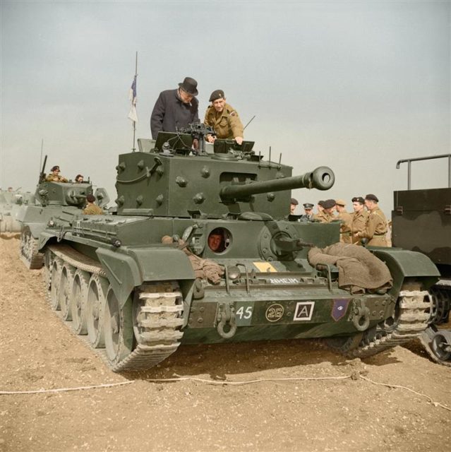 Britain’s prime minister inspects one of the tanks that would go on to liberate what is now the capital of Europe – Brussels. “Winston Churchill inspects a Cromwell tank in March 1944 as the 2nd Battalion Welsh Guards prepared for D-Day.” Photographed at Pickering, Yorkshire, England by unknown, image courtesy of the Welsh Guards Archive. Colourised by Tom Marshall