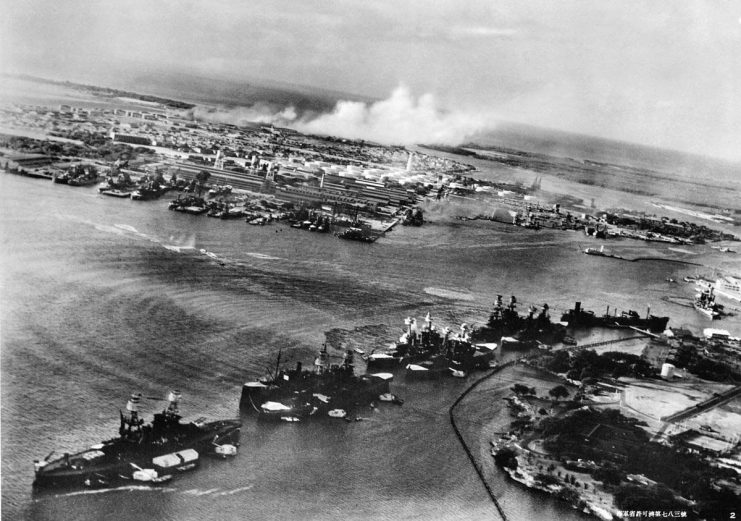 Pearl Harbor Attack, 7 December 1941: Torpedo planes attack “Battleship Row” at about 08:00 on 7 December, seen from a Japanese aircraft.
