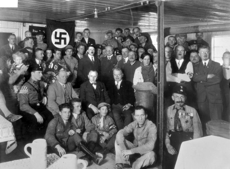 Hitler with Nazi Party members in the 1930s.
