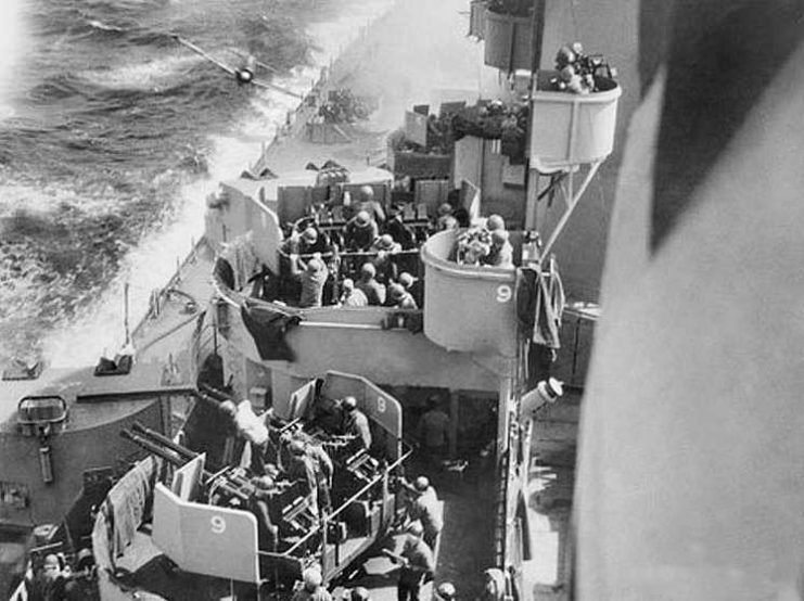 This photo was taken 11 April 1945. The kamikaze plane on the left of the photo is about to hit the Missouri.