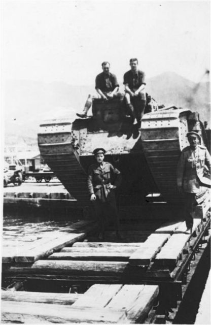 Cpt Elliot Hotblack the hero officer of the Tank Corps, in characteristic style standing in front of the tank. Photo credits: The Tank Museum