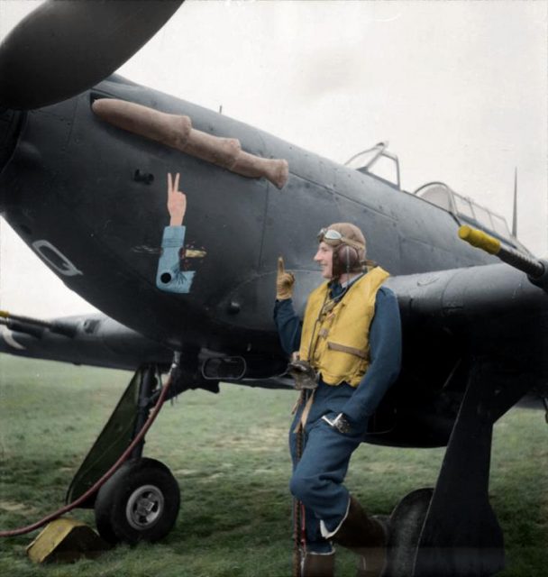 Squadron Leader J A F MacLachlan, the one-armed Commanding Officer of No 1 Squadron RAF, standing beside his all-black Hawker Hurricane Mark IIC night fighter, ‘JX-Q’, at Tangmere, Sussex. Paul Reynolds / mediadrumworld.com