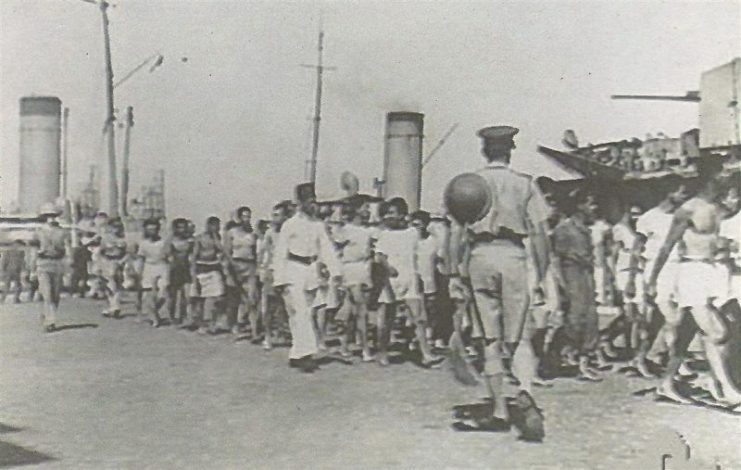 Italian prisoners marching along Alexandria streets