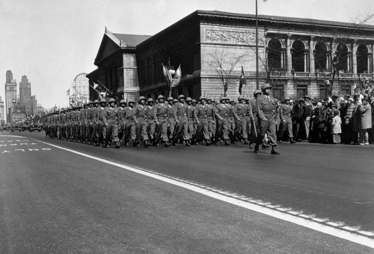 Members of the 555th (Triple Nickel) Parachute Infantry Battalion march down Michigan Avenue in Washington, DC on April 6, 1945. The Triple Nickel was an all black airborne unit in World War II and the end of the war became on of the first smoke jumping units in U. S. Department of Agriculture Forest Service. Photo courtesy of National Archives and Records Administration.