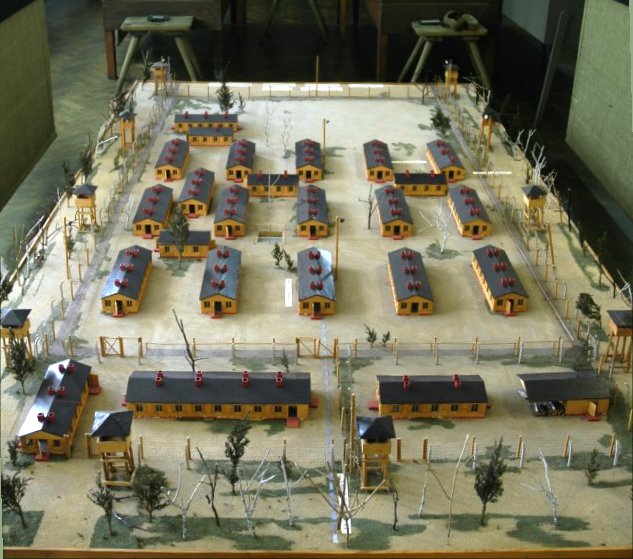 Model of the set used to film the movie The Great Escape. It depicts a smaller version of a single compound in Stalag Luft III. The model is now at the museum near where the prison camp was located. Photo: archidiecezja.lodz.pl / CC BY-SA 3.0.
