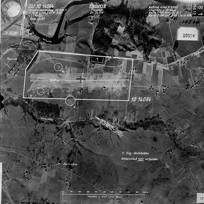 Aerial Image of Airfield in Lituania with notations indicating length of runway and anti-aircraft guns. Source: Aerial Photographs, compiled 1935–1970; Records of the Defense Intelligence Agency, Record Group 393; National Archives at College Park, College Park, MD.