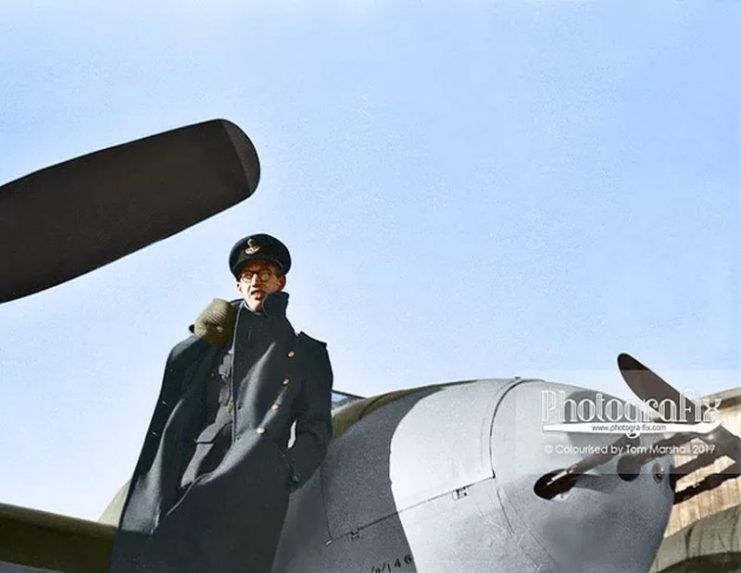 Flight Lieutenant Richard Harrison stands on the wing of a Mosquito FBV16, at RAF Lüneburg, in 1947.