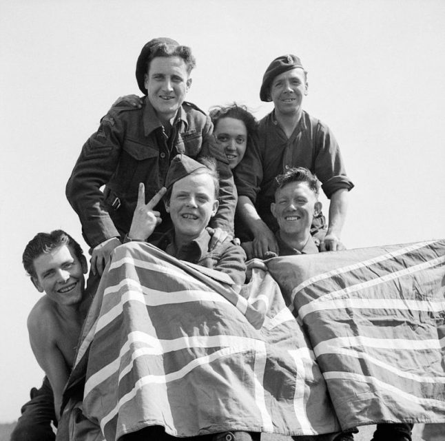 British Prisoners of War celebrate their liberation from Stalag 11B at Fallingbostel, 16 April 1945.