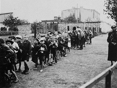 Children rounded up for deportation to the Chełmno death camp, September 1942
