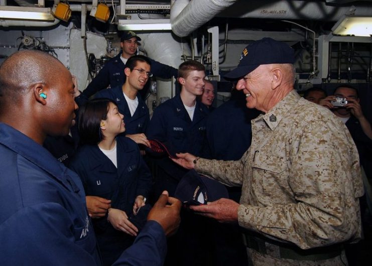 Retired Gunnery Sgt. R. Lee Ermey visits with Sailors and Marines aboard the multi-purpose amphibious assault ship USS Iwo Jima (LHD 7).