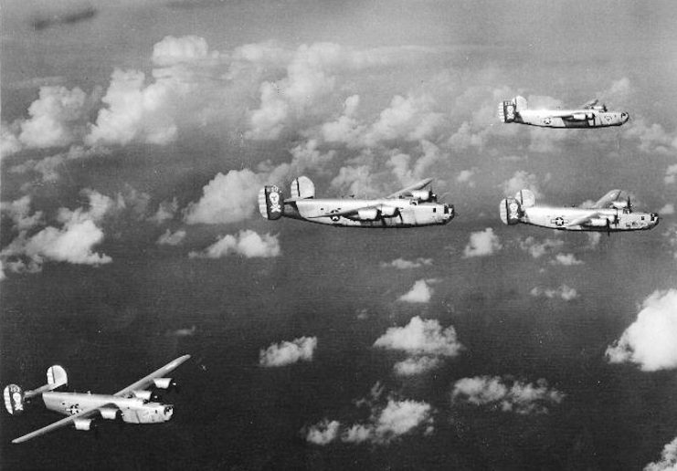 Formation of 90th Bombardment Group B-24Ds over the south pacific, 1943.