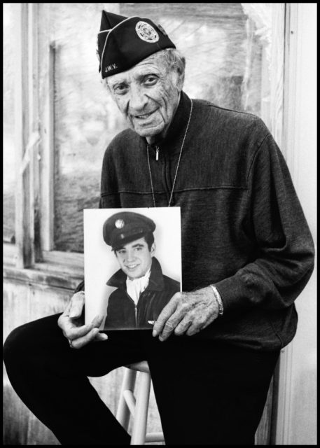 Ninety-one-year-old Stanley Feltman of Coram with his Army Air Corps portrait from 1943. Photo credits: David Paone
