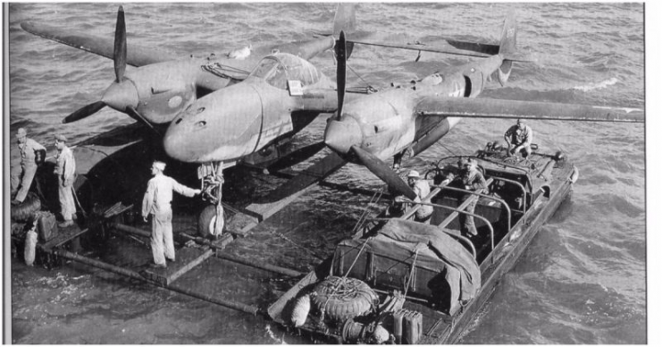 DUKWs transporting a P-38