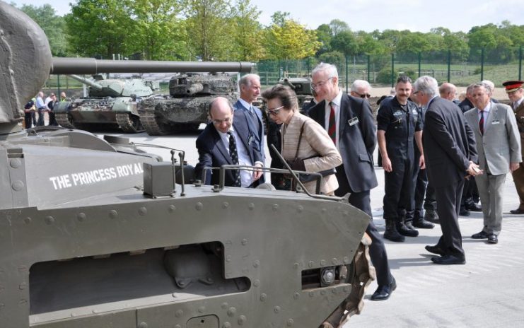Museum director Richard Smith shows The Princess Royal the tank named in her honour