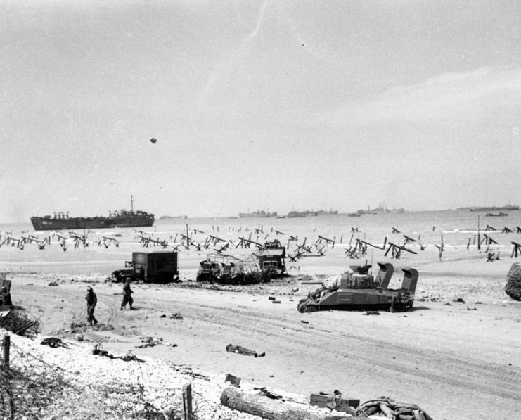 Destroyed vehicles on Omaha, 6 June 1944.