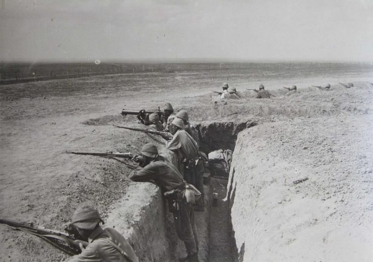 Soldiers fighting in Middle East trenches during WWI.