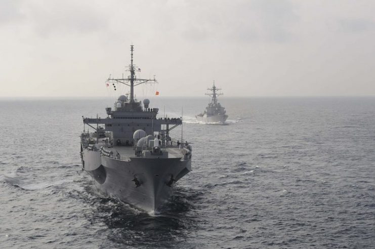 The U.S. 7th Fleet command ship USS Blue Ridge, left, and the guided-missile destroyer USS Stethem.