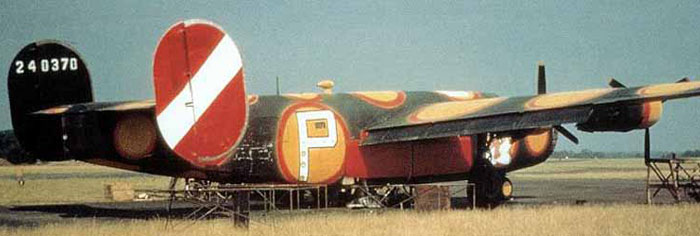 A rare colour photograph shows off the giant red-outlined orange polka dots of the striking paint scheme of Pete The Pom Inspector.