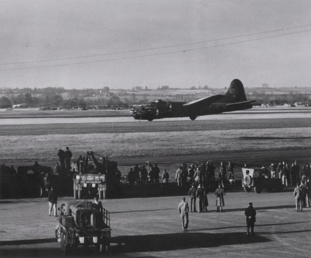 B-17F Fortress aircraft of the 91st BG, 8th Air Force executing a low fly-over during a demonstration at Bassingbourn, England, United Kingdom, 1943
