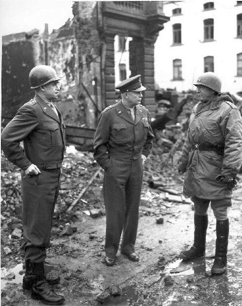 Bradley, Eisenhower and Patton in Bastogne, Belgium, 1945.