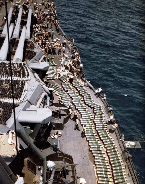 14-inch (35.6 cm) projectiles on the deck of the U.S. Navy battleship USS New Mexico (BB-40), while the battleship was replenishing her ammunition supply prior to the invasion of Guam, July 1944.