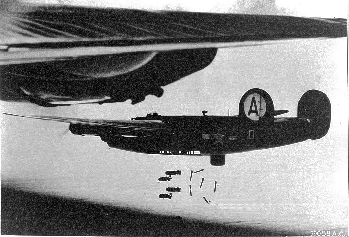 482d Bomb Group B-24s from RAF Alconbury England on a bomb run over occupied Europe – 1943.