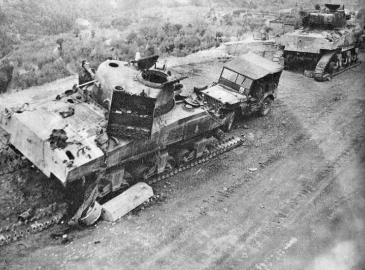 Two knocked out Commonwealth Sherman IIIs (M4A2s)