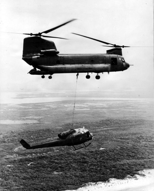 Recovery of a downed UH-1 by a CH-47 in Vietnam.