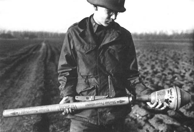US soldier posing with a captured Panzerfaust, c. 1944