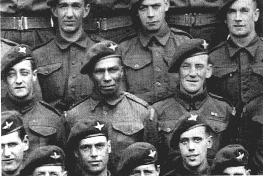 Private Sidney Cornell above in the middle center.