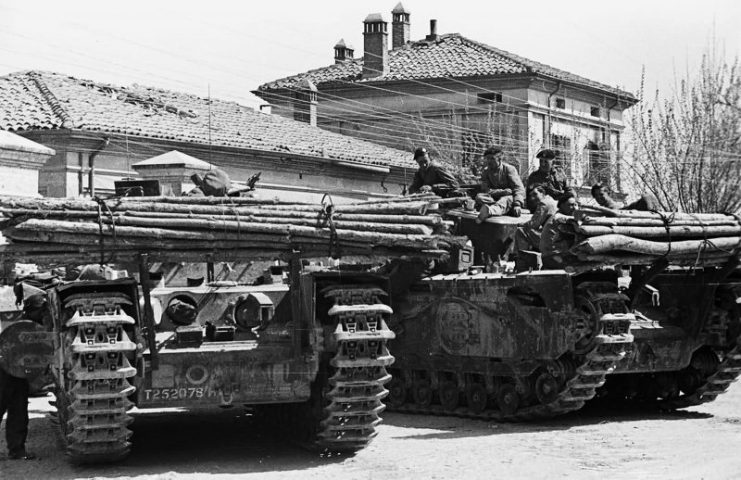 Flame throwing tanks Churchill Crocodiles wait in Granarolo dell’Emilia Italy April 1945