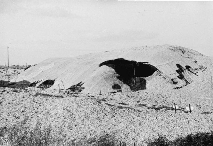 One of the centrifugal pump houses at Dungeness, camouflaged to resemble the surrounding gravel quarry in which it was sited.