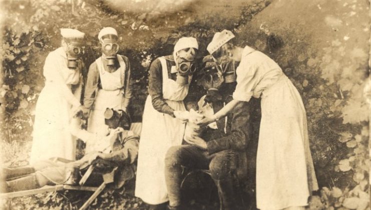 Nurses in gas masks at the trenches in Germany during World War I.