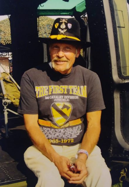 Gregory is pictured at an event in Indianapolis several years ago, during which he posed for a photo in the door of a UH-1 Huey helicopter—the type used extensively by the air cavalry in Vietnam.