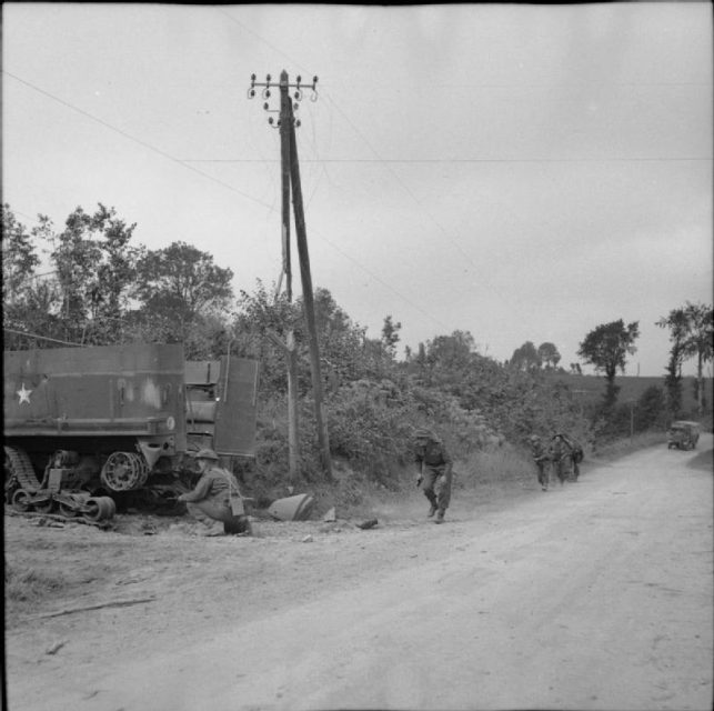 Men of the Green Howards mopping up German resistance near Tracy Bocage, Normandy, France, 4 August 1944.