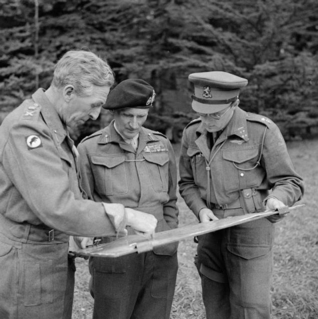 Planning of Market Garden. Field Marshal Montgomery studies a map with Lt-Gen Horrocks, GOC XXX Corps, and Prince Bernhard of the Netherlands.