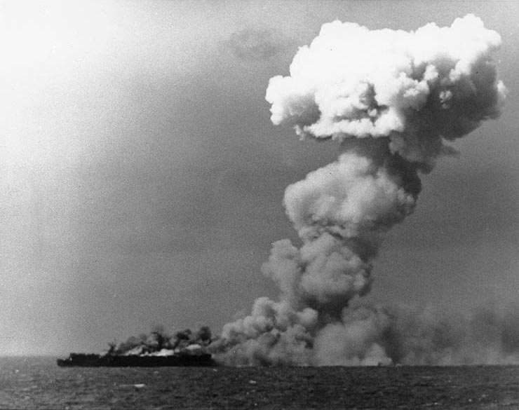 The U.S. Navy light aircraft carrier USS Princeton (CVL-23) burning soon after she was hit by a Japanese bomb while operating off the Philippines on 24 October 1944.