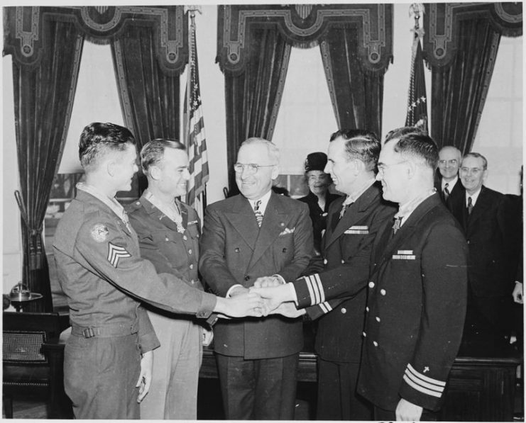 O’Callahan (right) with President Harry S. Truman (center) and other Medal of Honor recipients at their medal presentation ceremony in 1946.