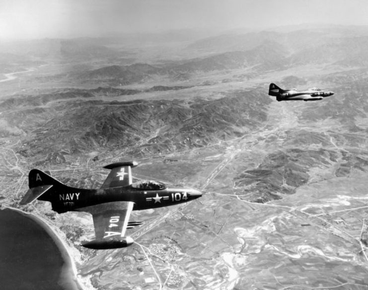 Two F9F-2Bs of VF-721 over Korea.