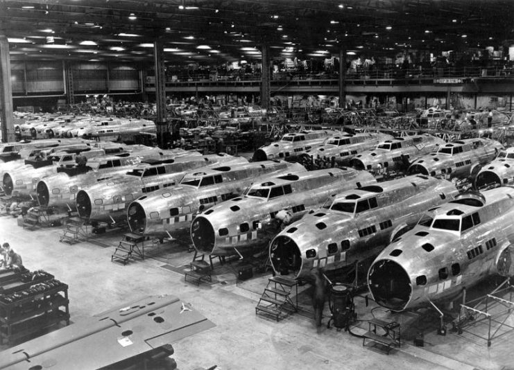 Boeing B-17Es under construction. This is the first released wartime production photograph of Flying Fortress heavy bombers at one of the Boeing plants, at Seattle, Wash. Boeing exceeded its accelerated delivery schedules by 70 percent for the month of December 1942.