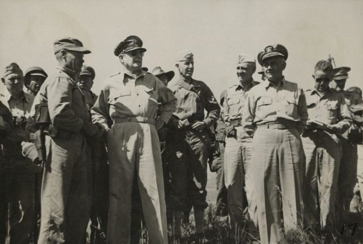 General MacArthur at Colonel Puller’s CP, 17 September 1950. By USMC Archives – CC BY 2.0